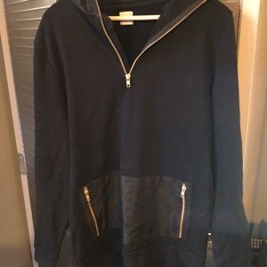 Black hoodie with gold zipper